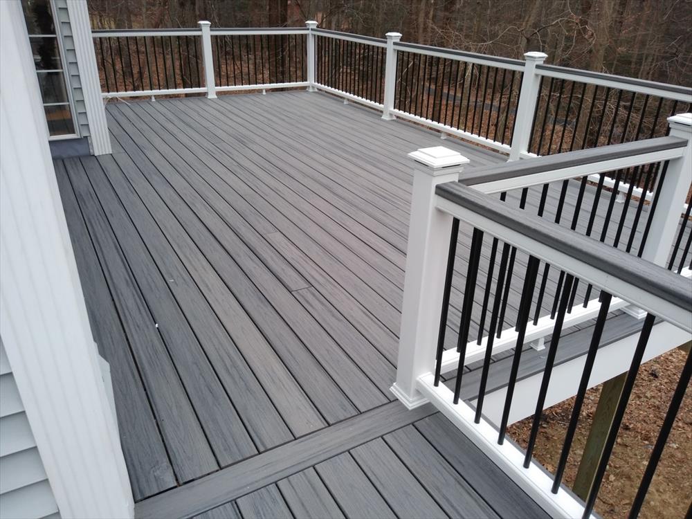 Custom deck with finished railing and outdoor living details