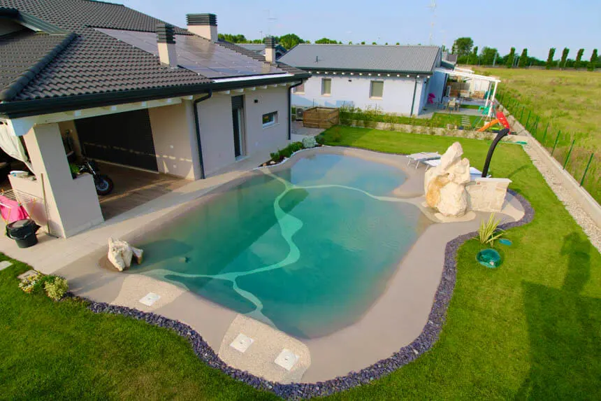 Custom lagoon pool aerial view with freeform design