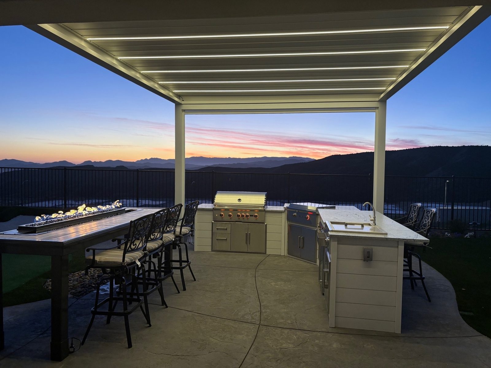 Built-in outdoor kitchen with bar seating