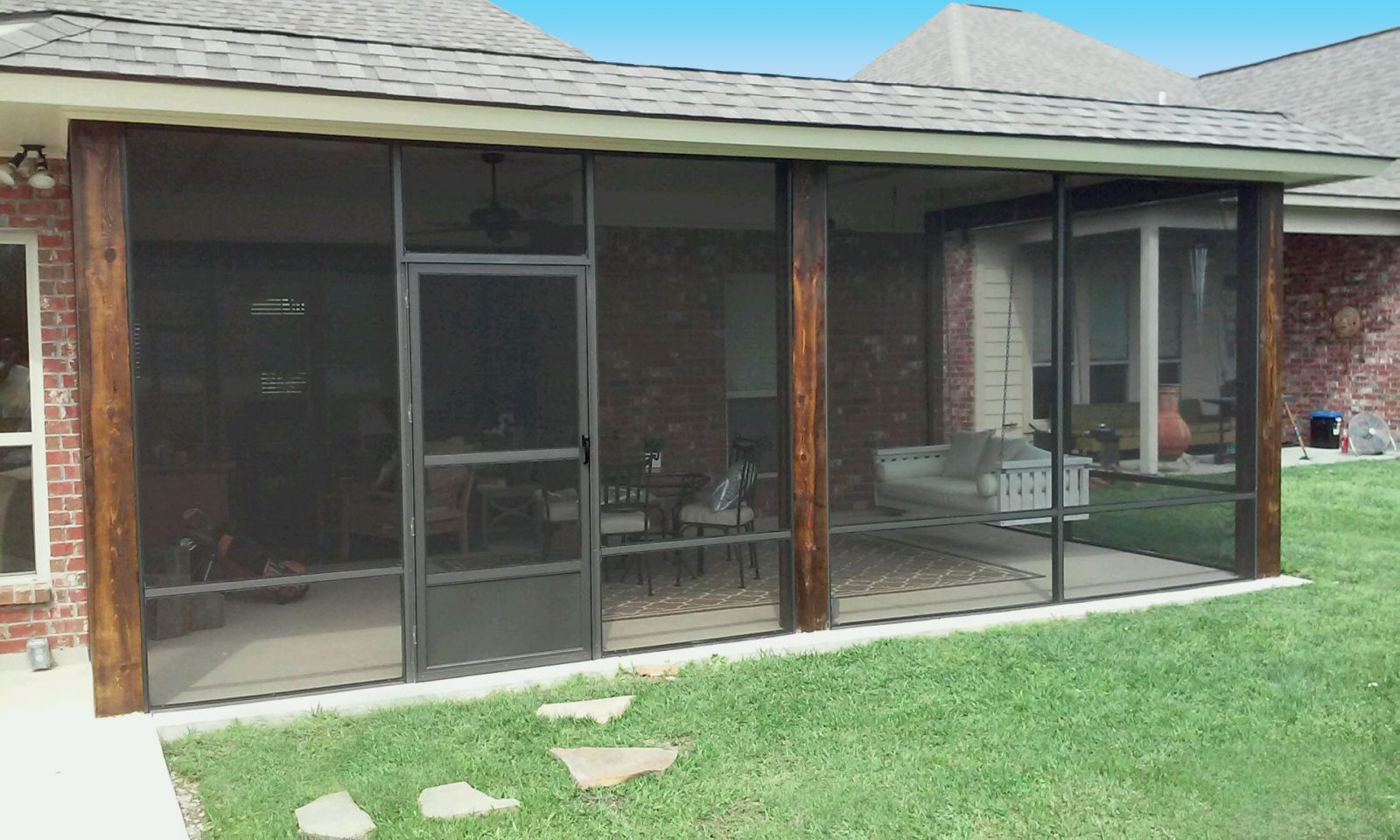 Screened porch connected to a home